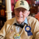 disney-celebrates-world-war-ii-veteran’s-101st-birthday-at-magic-kingdom-flag-retreat